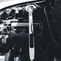 Detailed shot of a car engine showcasing its components, highlighting automotive technology.
